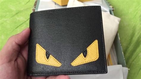 fendi wallet yellow eyes|monster eyes bifold wallet.